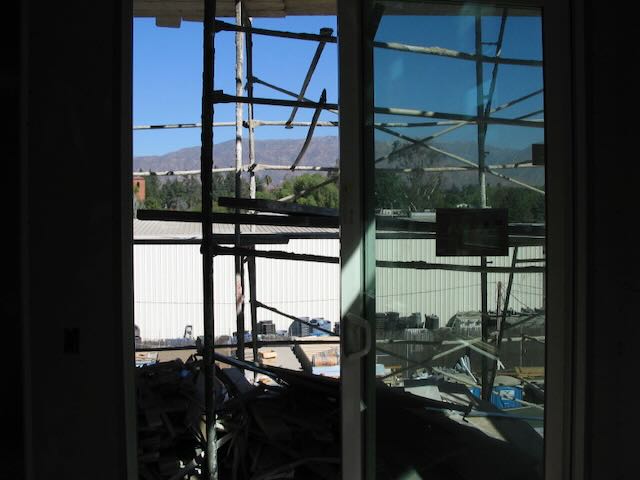 a balcony piled with junk