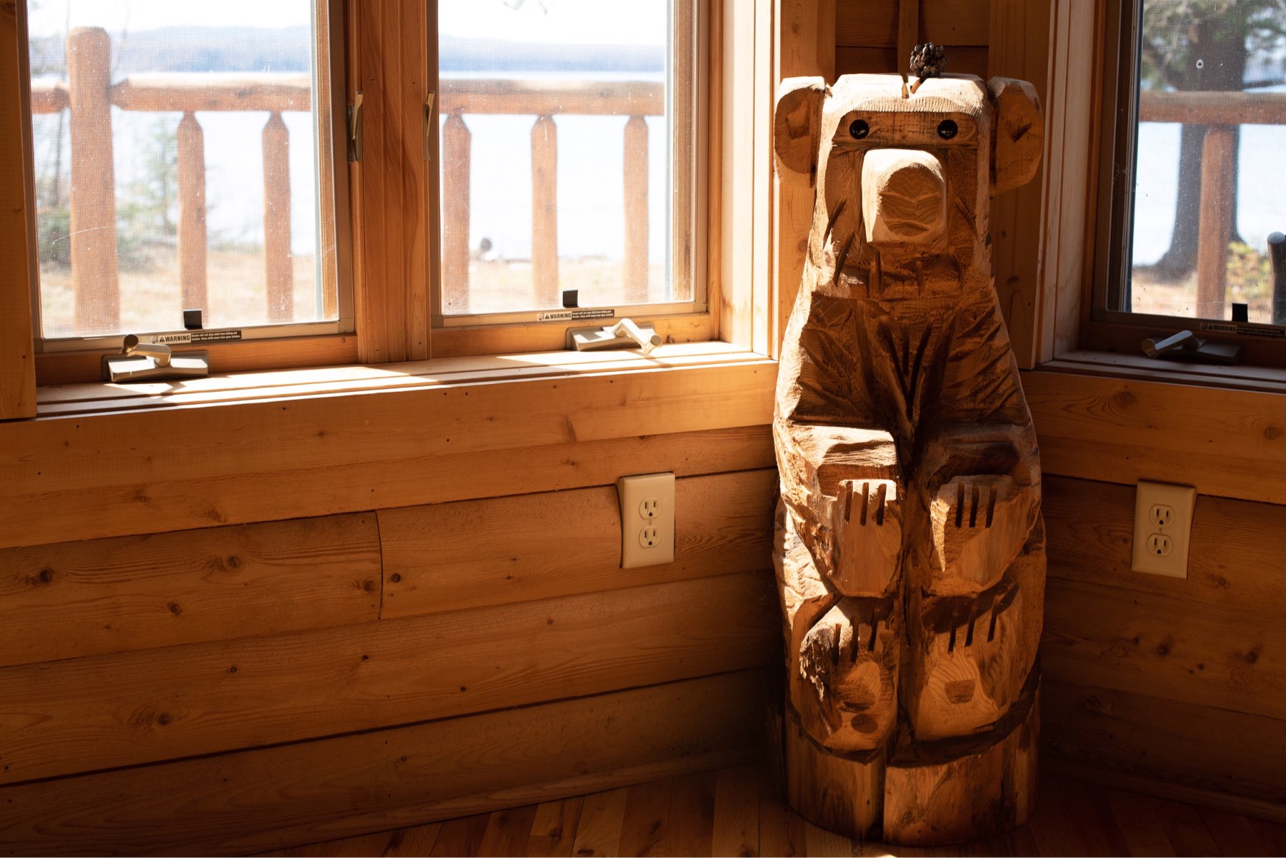 A three-foot tall carved wooden bear