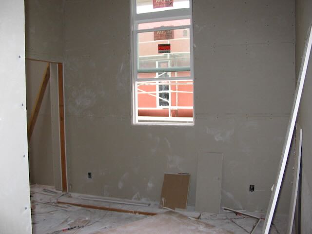 the spare bedroom of an under-construction condo