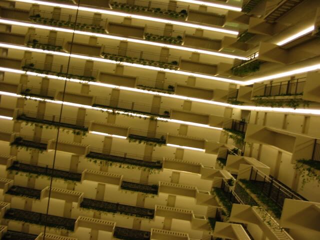 an off-kilter photo of a hotel interior with many visible doorways