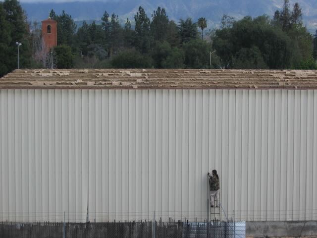 an old warehouse at the start of demolition