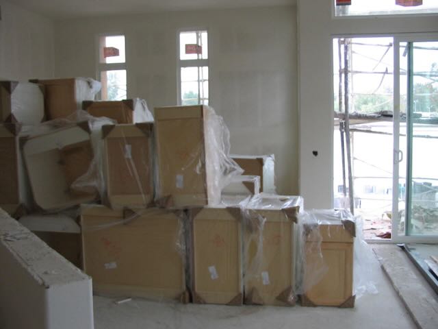 a stack of cabinets waiting to be installed