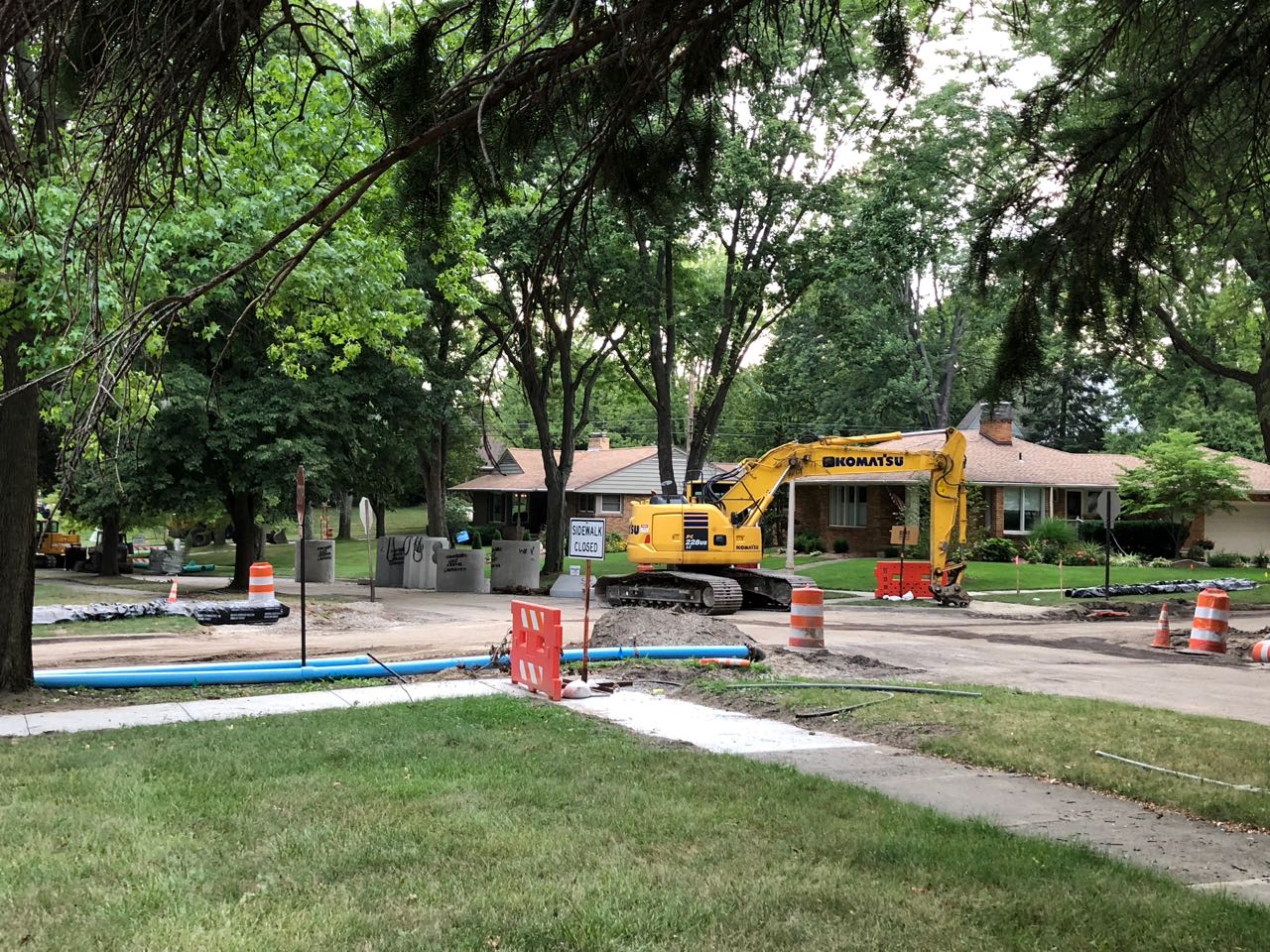 Heavy equipment parked on a residential street