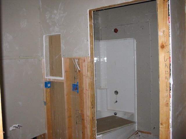the hall bath of an under-construction condo