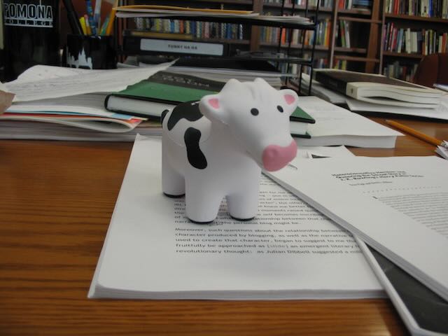 a squishy cow on a desk