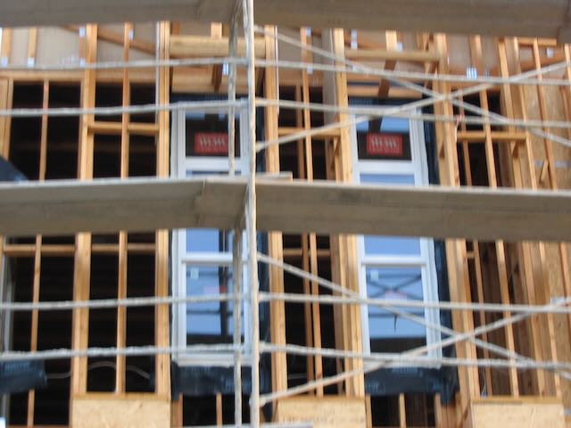 windows visible behind scaffolding