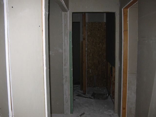 the hallway of an under-construction condo