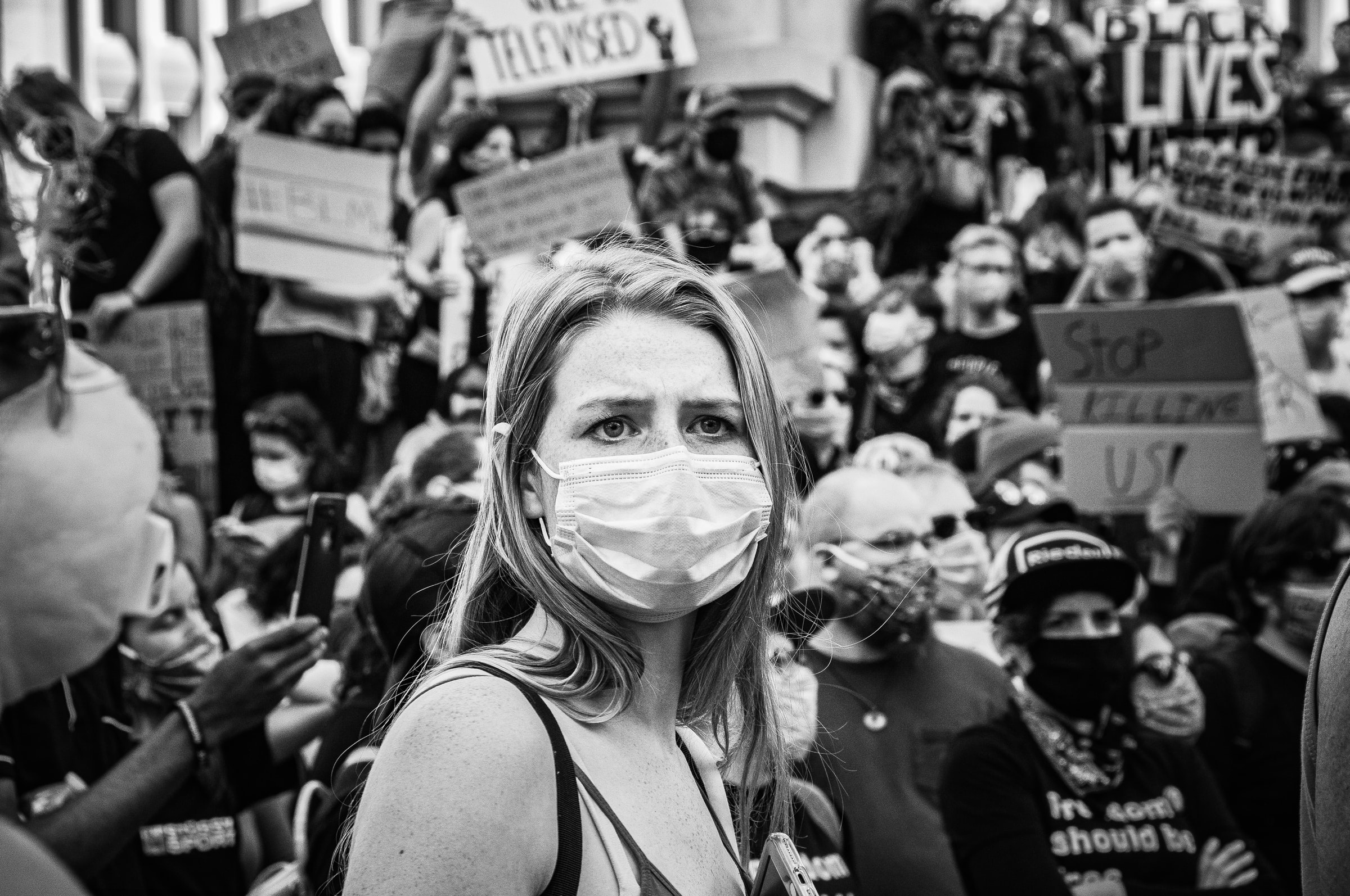 female protester in mask