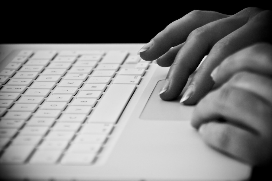 Fingers on a trackpad